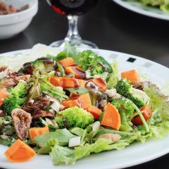 A picture of Salad with figs, sweet potatoes and broccoli.