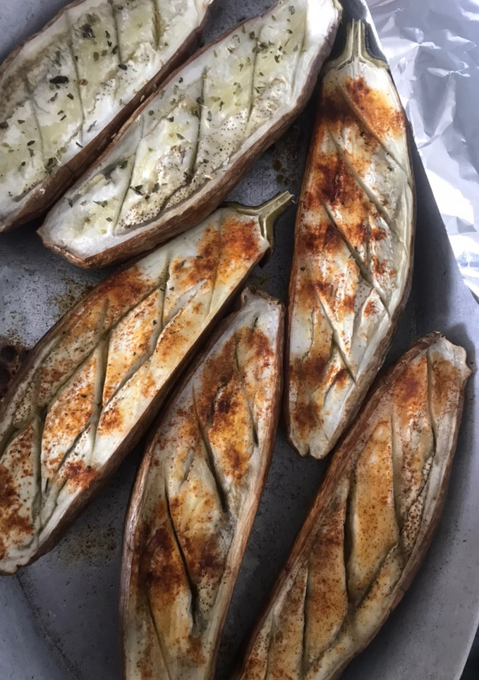 Una foto de Berenjenas asadas