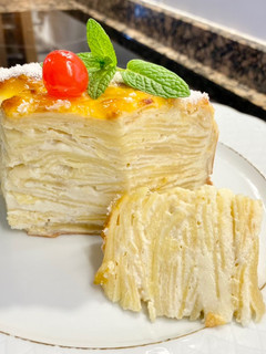 Una foto de Tarta con queso mascarpone y manzanas laminadas