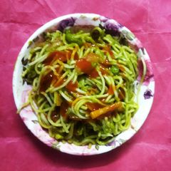 A picture of Thai Green Curry with Noodles.