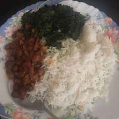A picture of Rice, beans and creamed spinach.