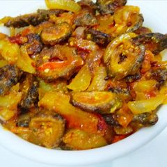A picture of Bitter Gourd with Potatoes.