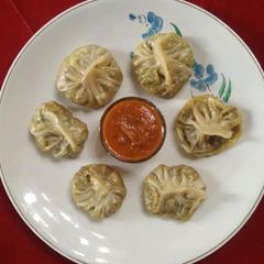 A picture of Momos With Paneer Veg Stuffing.