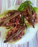 Cogollos de Tudela a la plancha con anchoas de Santoña y vinagreta de tomate seco