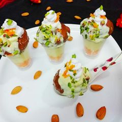 A picture of Chocolate Golgappe Stuffed with Motichur and basundi mousse.