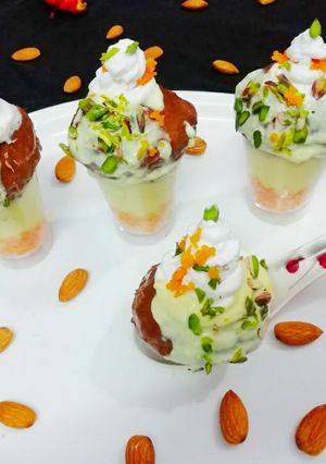 A picture of Chocolate Golgappe Stuffed with Motichur and basundi mousse.
