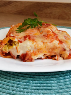 Una foto de Canelones de carne y ricotta