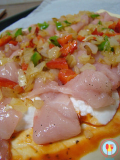 Una foto de Pizza de pollo