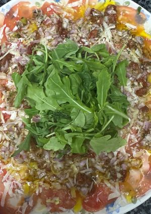 Una foto de 577. Carpaccio de tomate a las tres texturas (entrante)