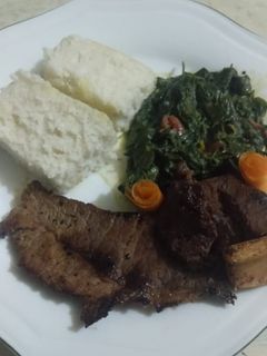 A picture of Pan fried beef with vegetables.
