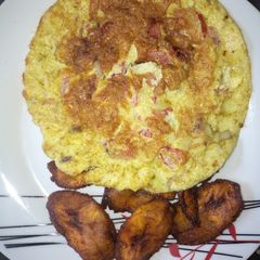 A picture of Plantain chips with fried egg.