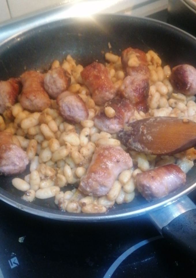 Una foto de Habichuelas rebozadas con ajo y butifarra