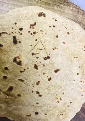 A picture of The regular chapati make it eye catching for your kids adding alphabets to it...!!.