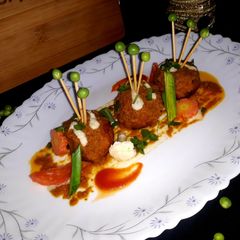 A picture of Mix vegetable malai kofta.