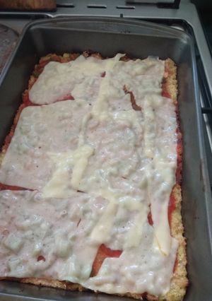 Una foto de Pizza con masa de coliflor