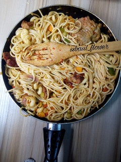 A picture of Spicy beef suya and chicken pasta.