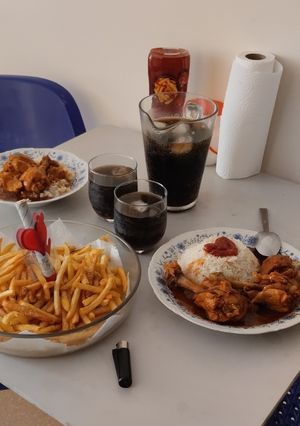 Foto principal de Pollo con Coca-Cola