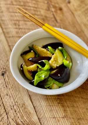 A picture of 🍆 Aubergine and basil marinated with olive oil salad.