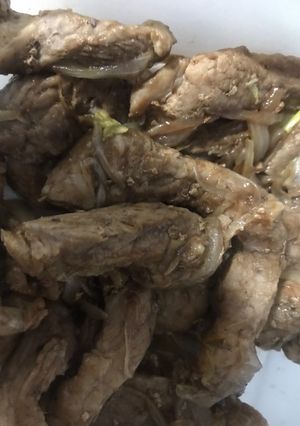 Una foto de Fajitas de cerdo encebolladas