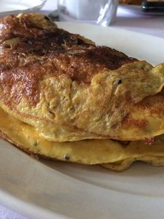 Une photo de Omelette aux pommes de terre nouvelles et tomates confites
