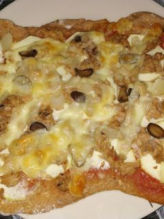 Una foto de Pizza de calabacín y atún