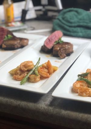 A picture of Fillet Mignon w/ Kicker Shrimp Scalloped Baby Potatoes.