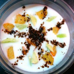 A picture of Cucumber and fried potato raita.