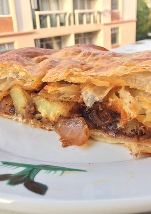 A picture of Savoury Potato And Onion Strudel With Leftover BBQ Sauce.