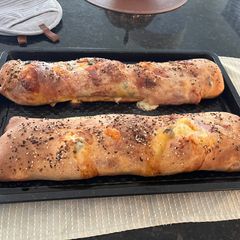 A picture of Layered Meat and Cheese Stromboli.