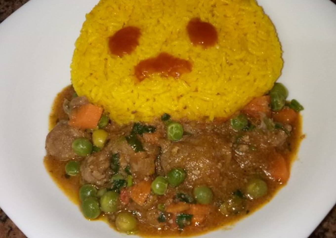 Tumeric rice and goat stew # author marathon