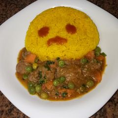 A picture of Tumeric rice and goat stew # author marathon.