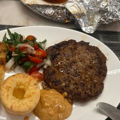 A picture of Pljeskavica (Serbian Burger) - an amazing mix of Beef, Lamb and Pork - WOW :P.