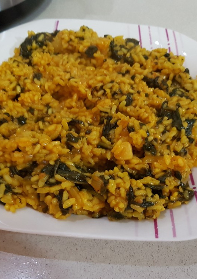 Una foto de Arroz y espinacas en olla GM