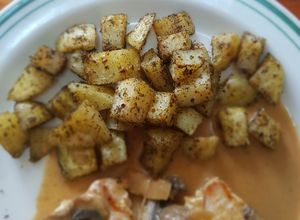 Una foto de Papitas al horno especiadas