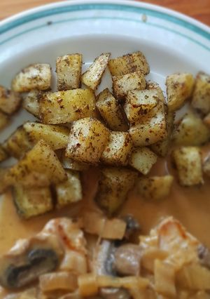 Una foto de Papitas al horno especiadas