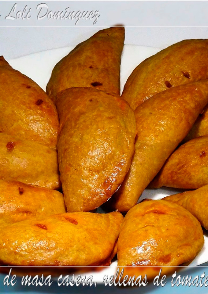 Una foto de Empanadillas de masa casera, rellenas de tomate