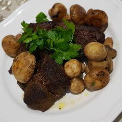 Meat steaks with mushroom A picture of Meat steaks with mushroom.