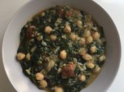A picture of sausage and leaf vegetable