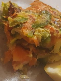 Una foto de Tortilla de zapallitos verdes, cebolla y zanahoria
