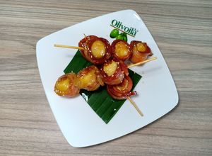 Hình của món Thịt xông khói cuộn trứng cút.