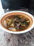 Caldo de papas con rajas y carne asada