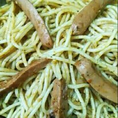 A picture of Italian chicken spaghetti Indian style.