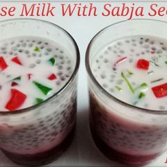 A picture of Rose milk with sabja seed.