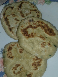 Una foto de Pan Naan de ajo y cilantro