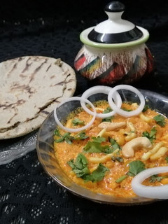 કાજુ ગાંઠિયા નું શાક (Kaju Gathiya Shak Recipe In Gujarati) રેસીપી મુખ્ય ફોટો
