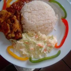A picture of White and stew with coslew.