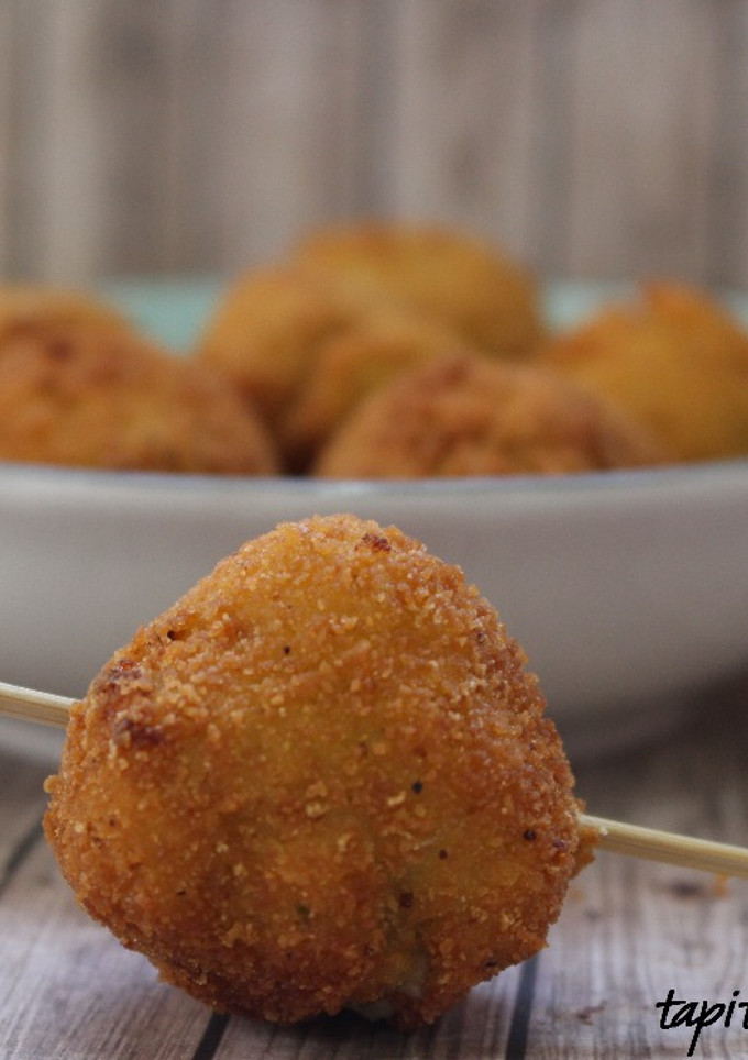 Una foto de Bolitas crujientes de calabacín y queso