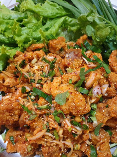 A picture of Crispy Chicken with Spicy Salad.