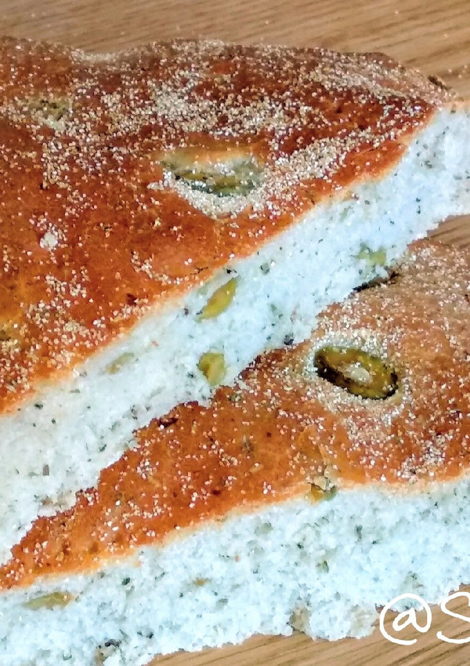 Una foto de 14.🥖Pan árabe con aceitunas rellenas y hierbas provenzales