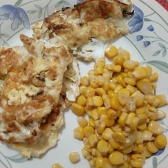 A picture of Fried Eggs with Sardine and a dash of sweet corn.